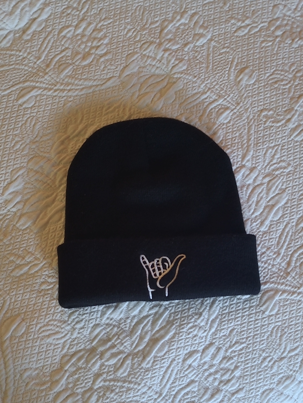 Black Knit Beanie With White Embroidered Shaka Hand Gesture